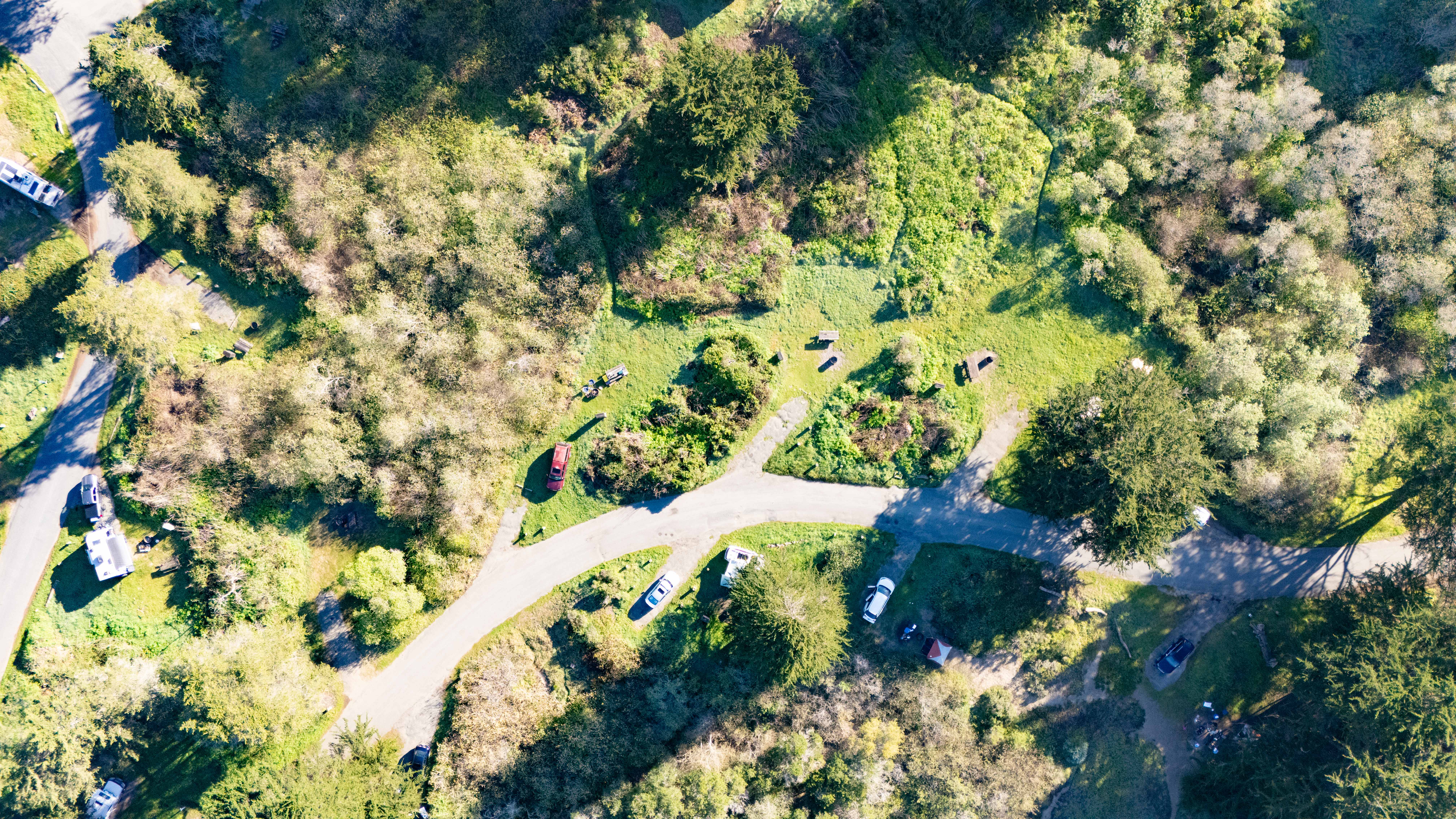 Aerial view of Bodega Dunes campground nestled in green coastal hills