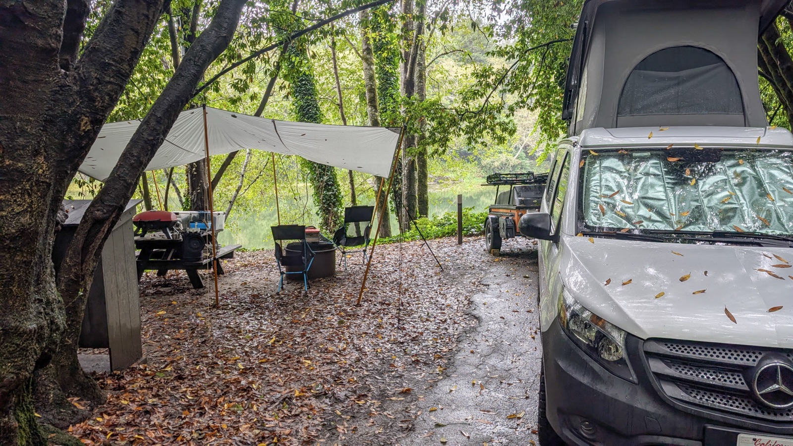 Camping tarp setup protecting the campsite during rain at Gualala Point