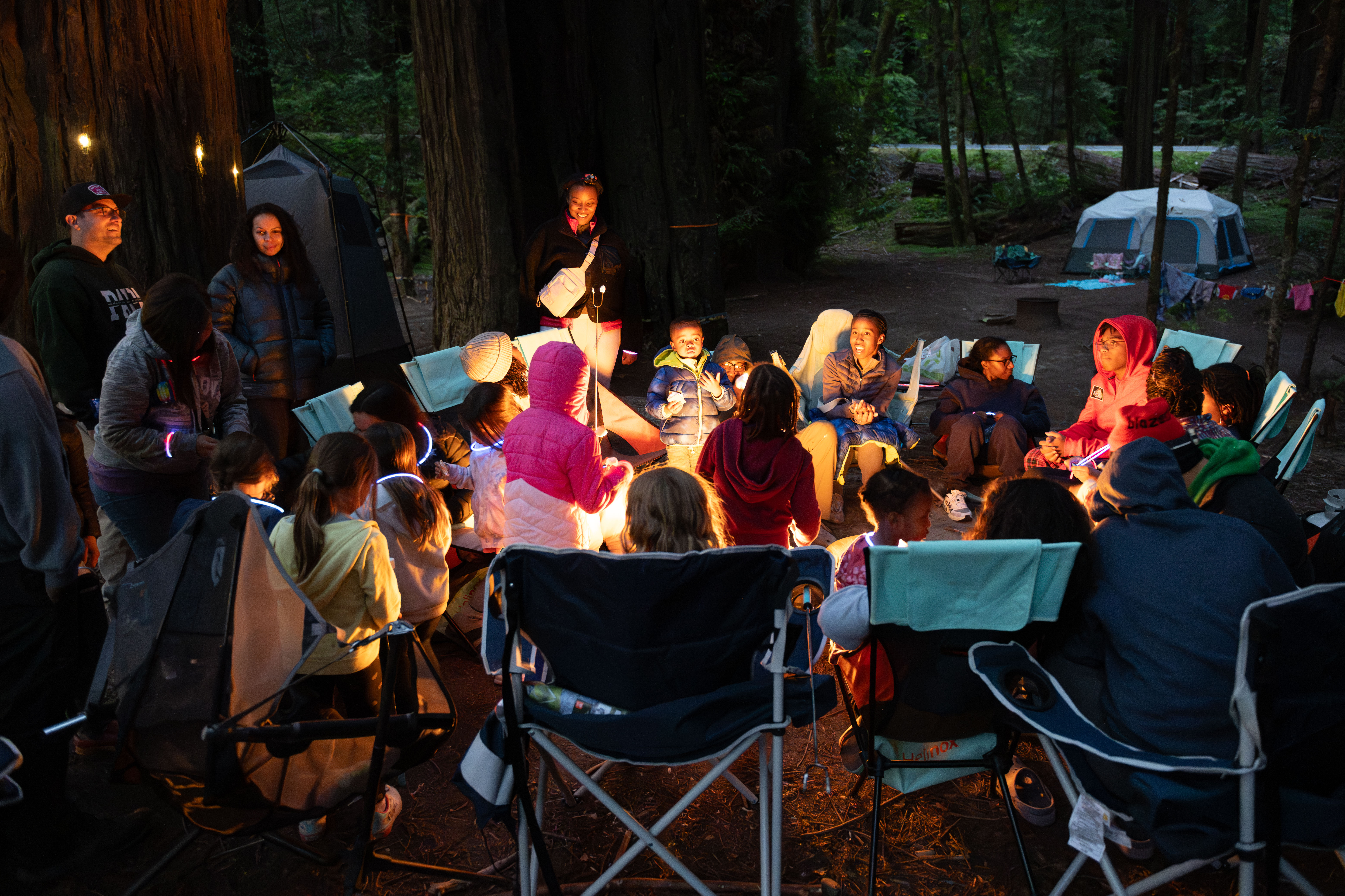 Evening campfire glowing at a campsite in Humboldt Redwoods