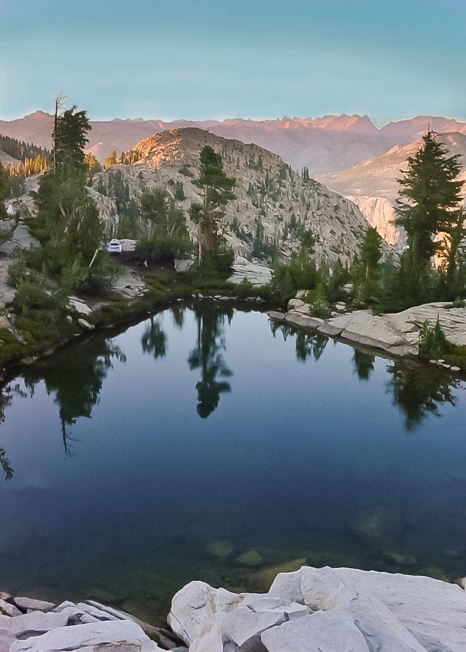 Alpine lake at sunset with Sierra Nevada peaks reflected in the water, taken on a backcountry trip in the Yosemite Wilderness, August 2007. Alpine lake at sunset with Sierra Nevada peaks reflected in the water, taken on a backcountry trip in the Yosemite Wilderness, August 2007.