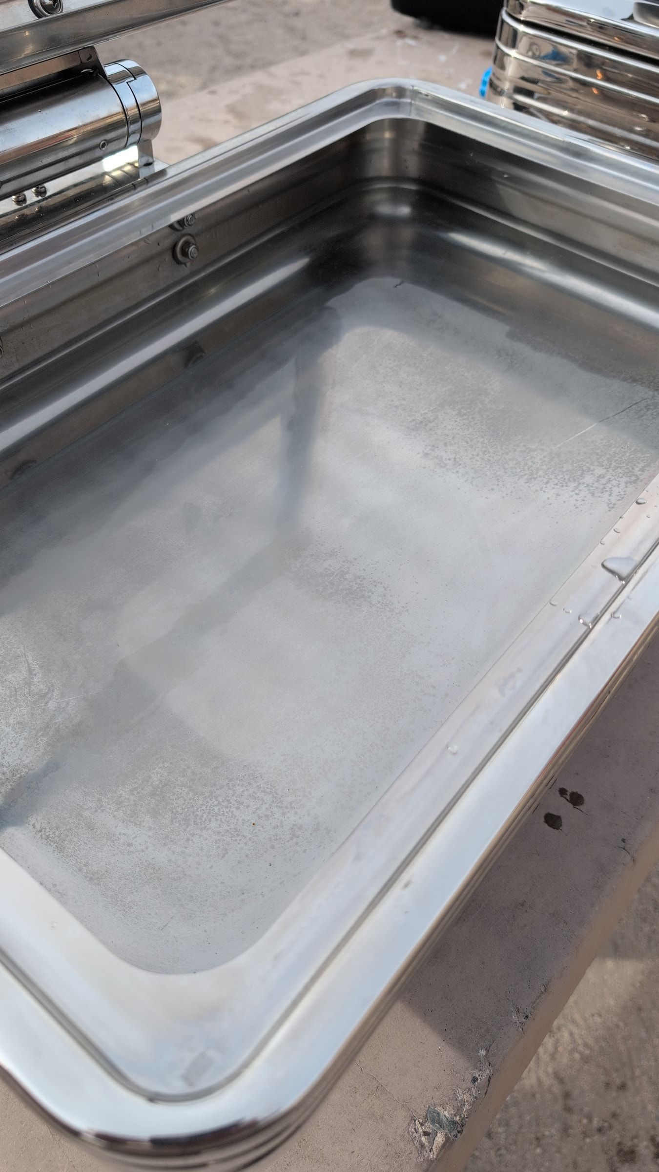 Photo of chafing dish filled with water before lighting