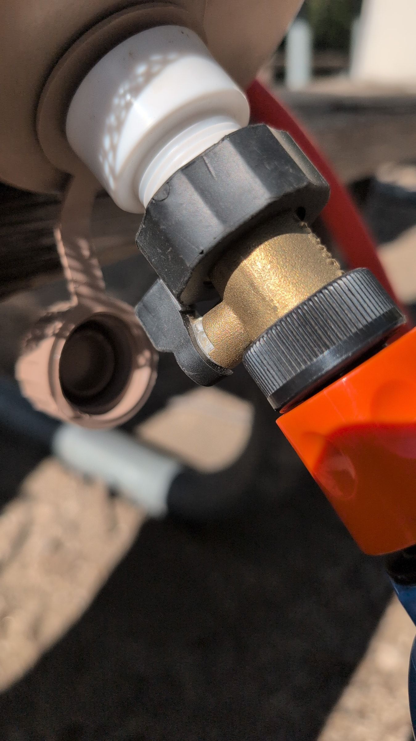 Close-up of water jug valve turned to open in-line position