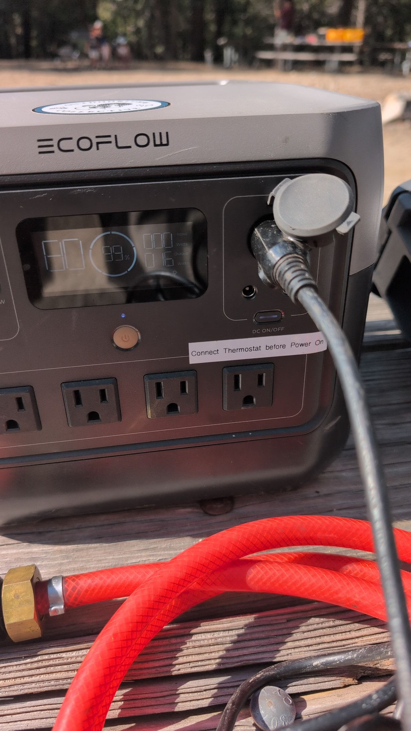 Photo of cigarette lighter plug connected to EcoFlow power station outlet