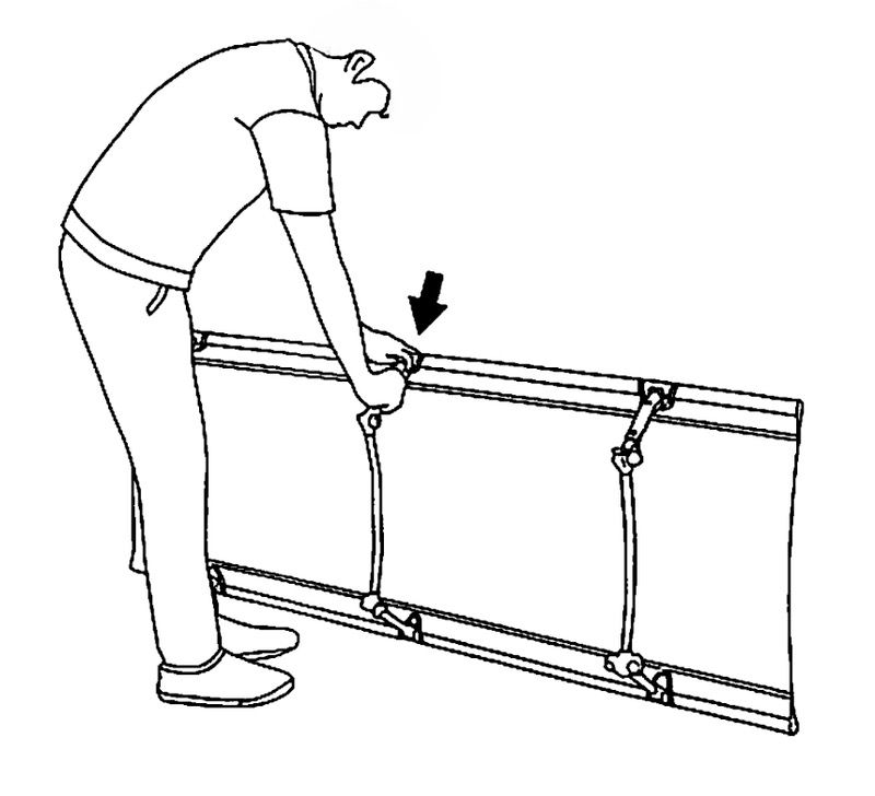 Photo of center leg assembly being attached to middle of cot frame