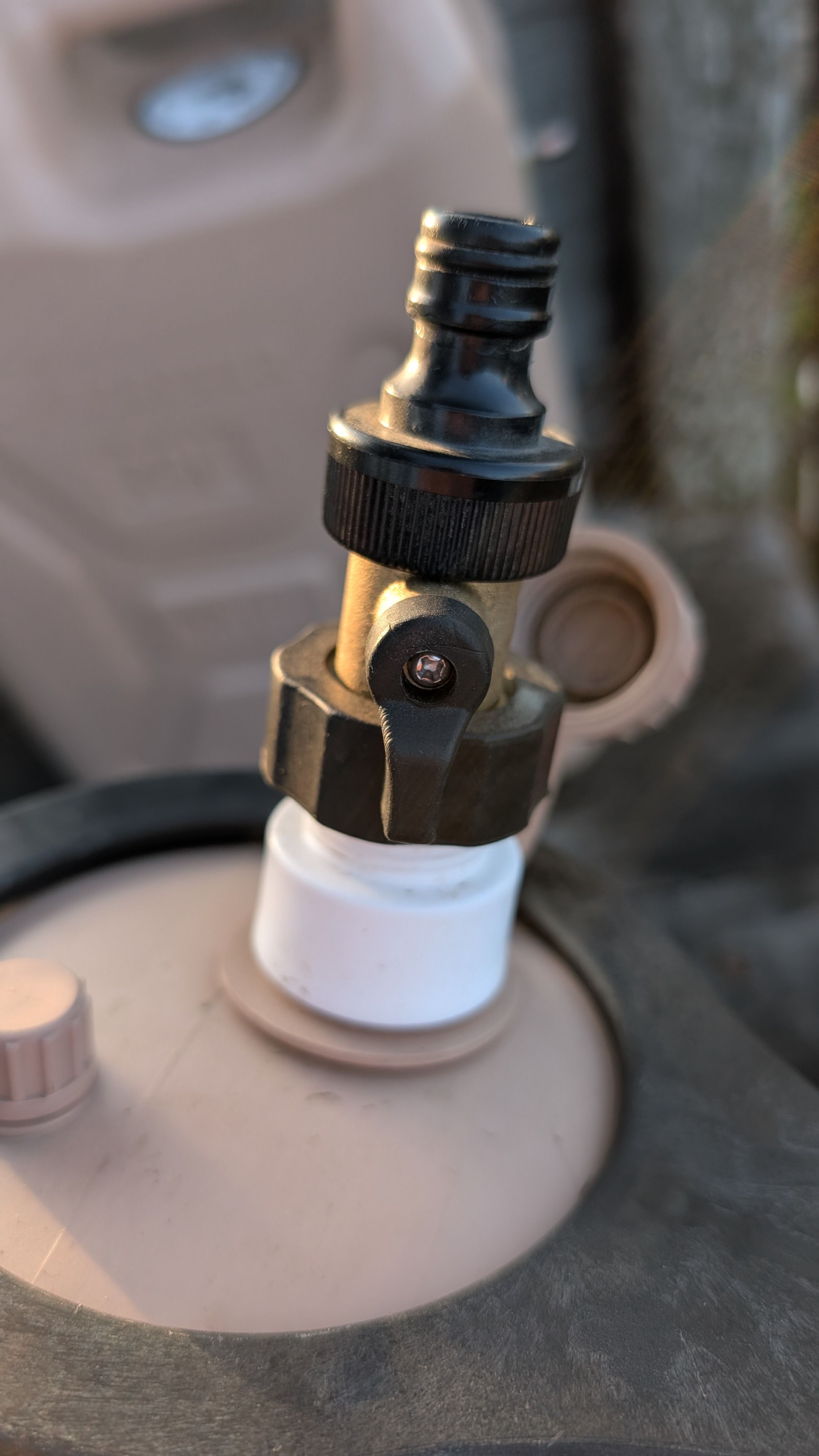 Close-up of brass valve in open position on Scepter jug