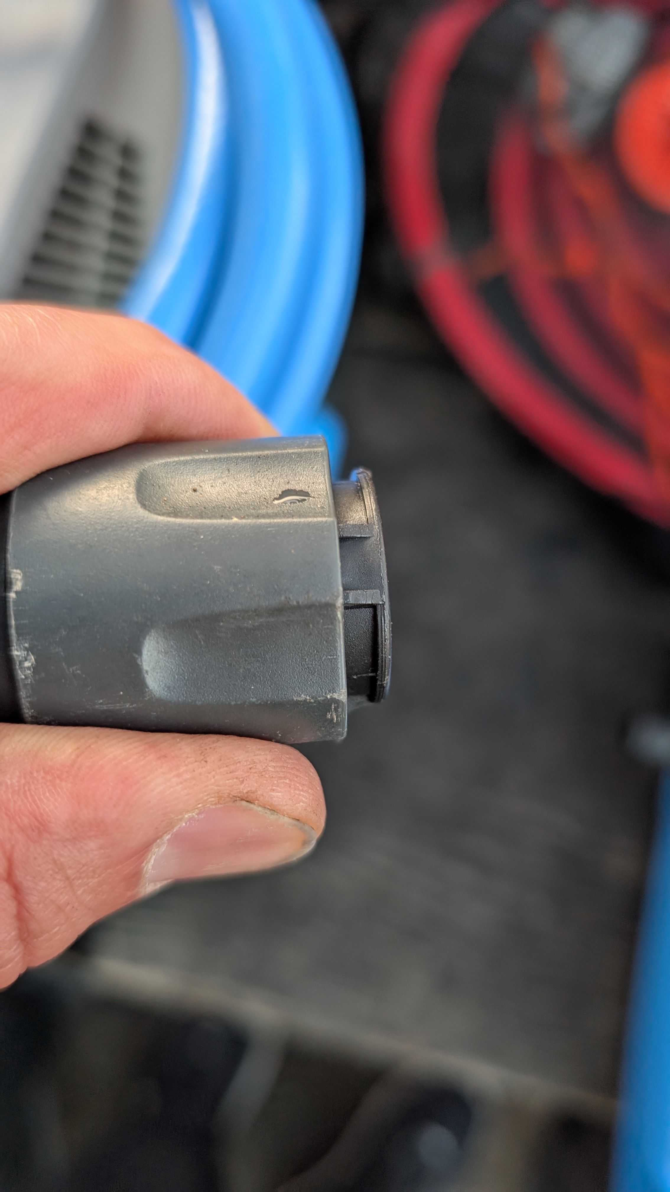 Close-up of quick-disconnect collar on hose end