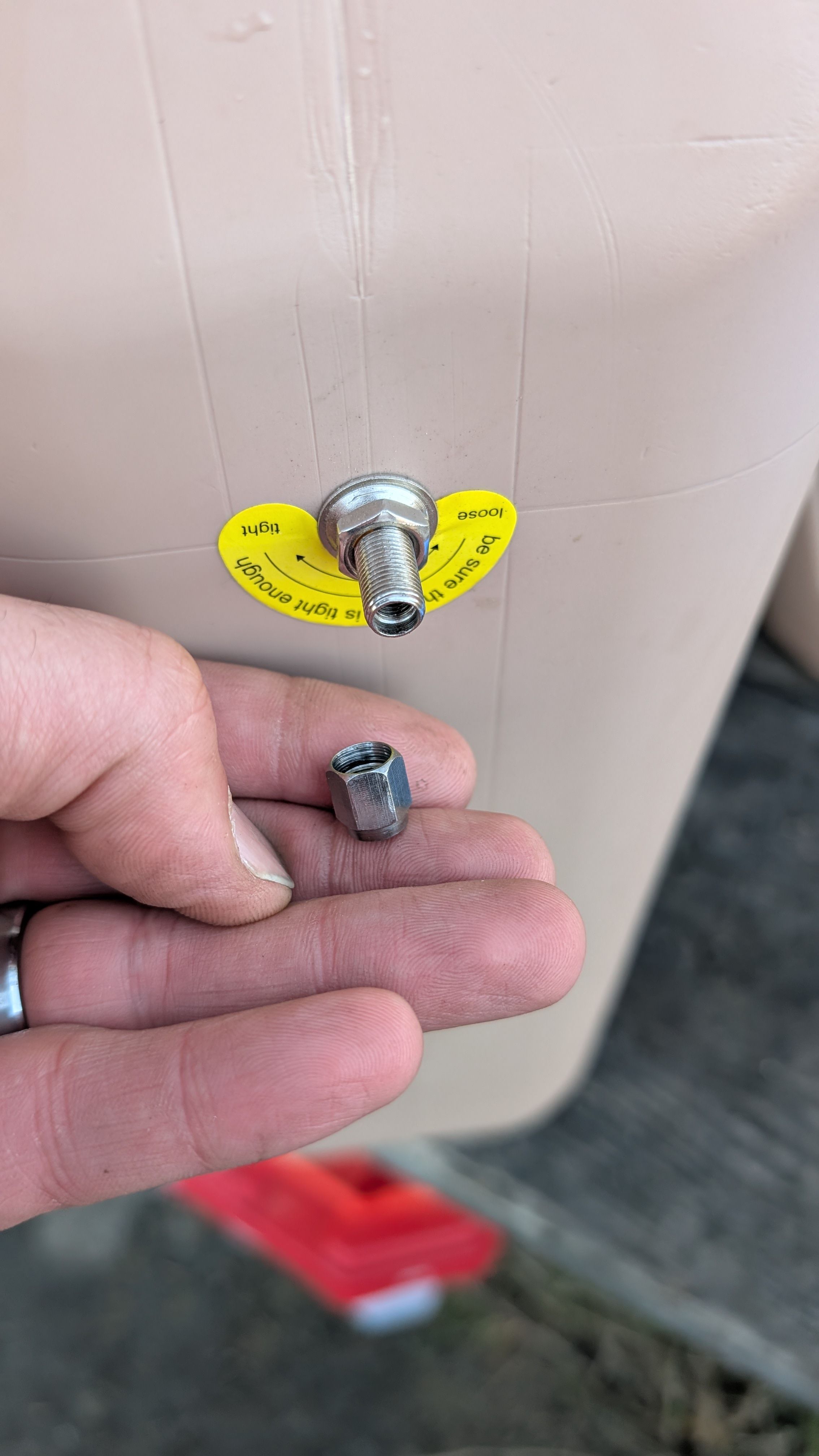 Photo of bleed valve cap removed showing open vent