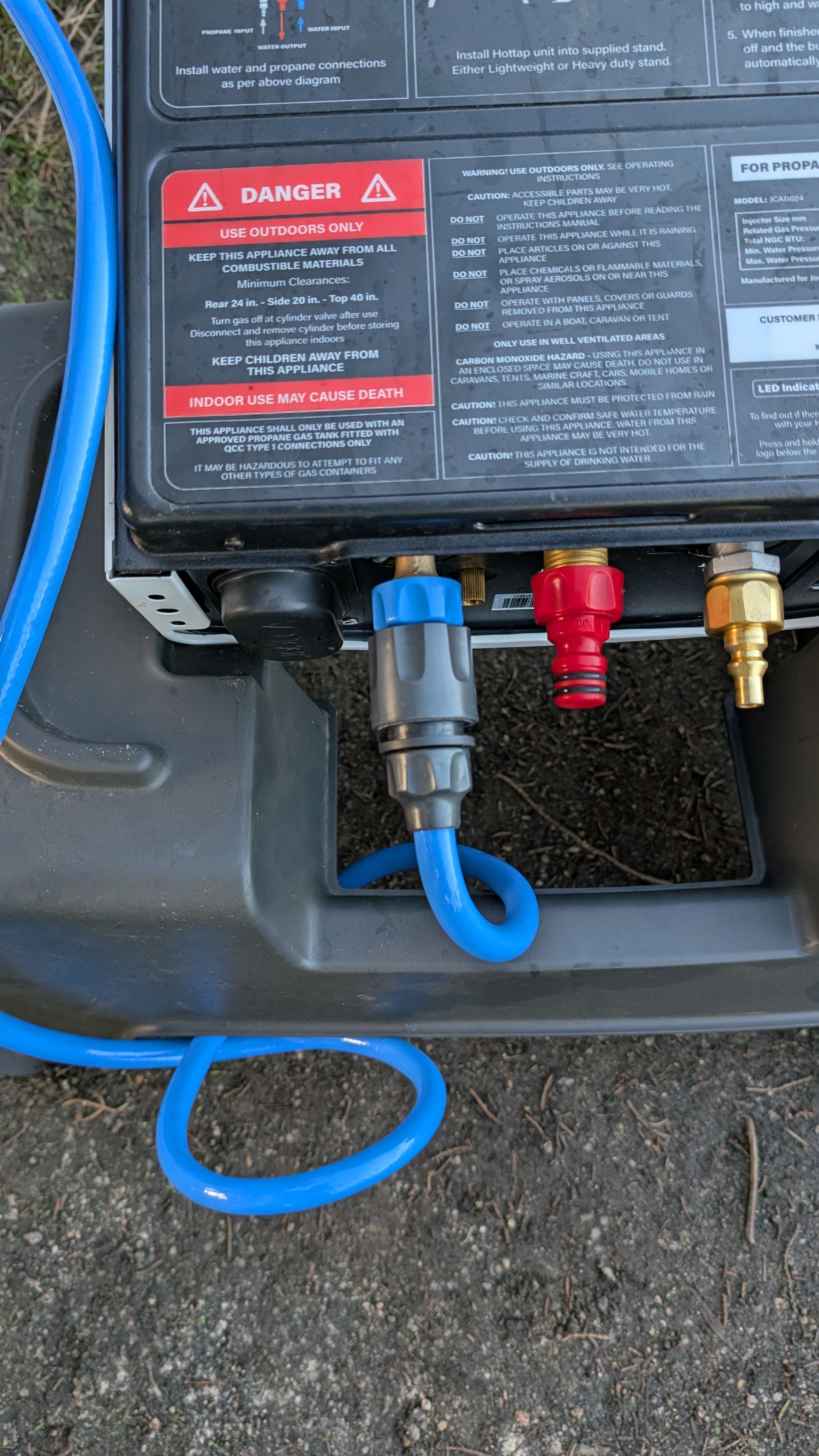 Photo of blue hose connected to blue inlet on bottom of Hottap