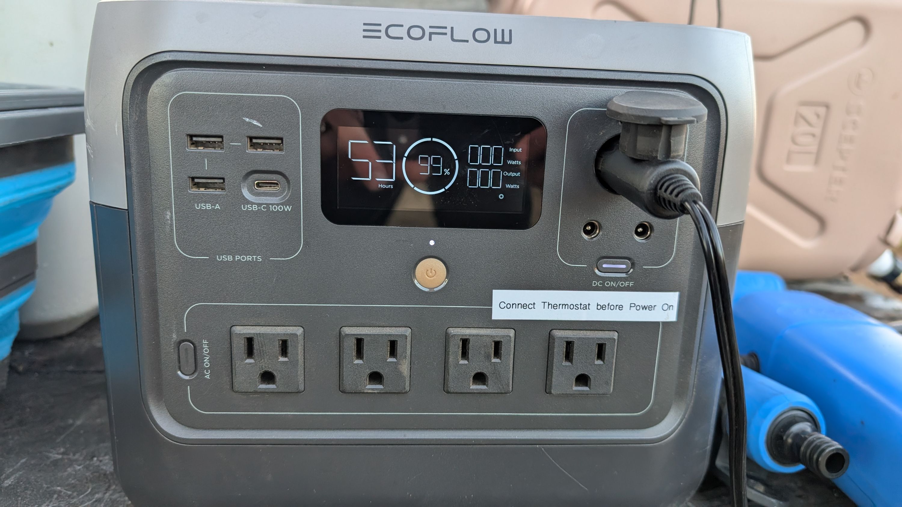 Photo of EcoFlow battery with cigarette lighter plugged in and DC on