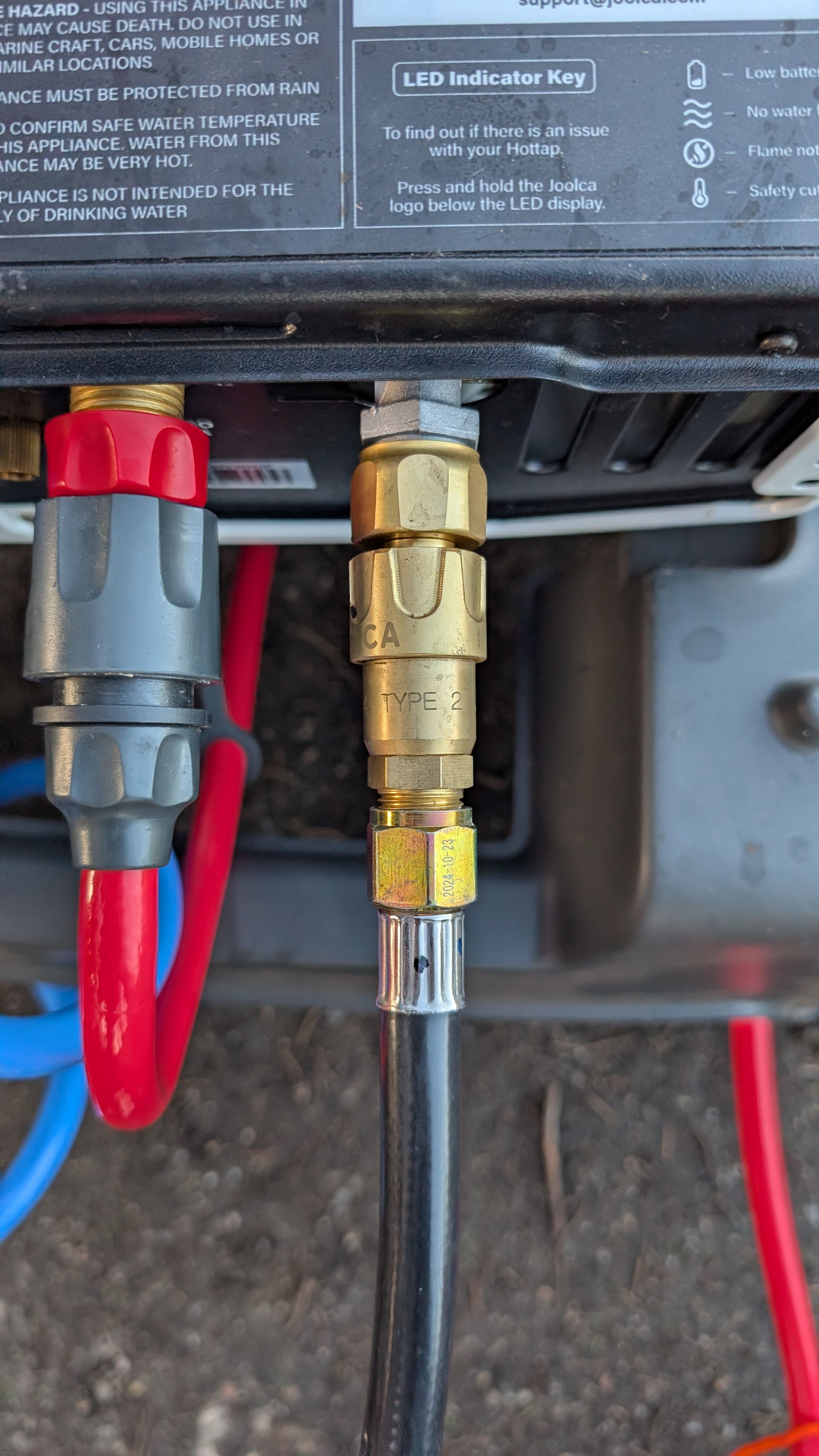 Photo of propane gas line connected to Hottap with Type 2 quick-disconnect