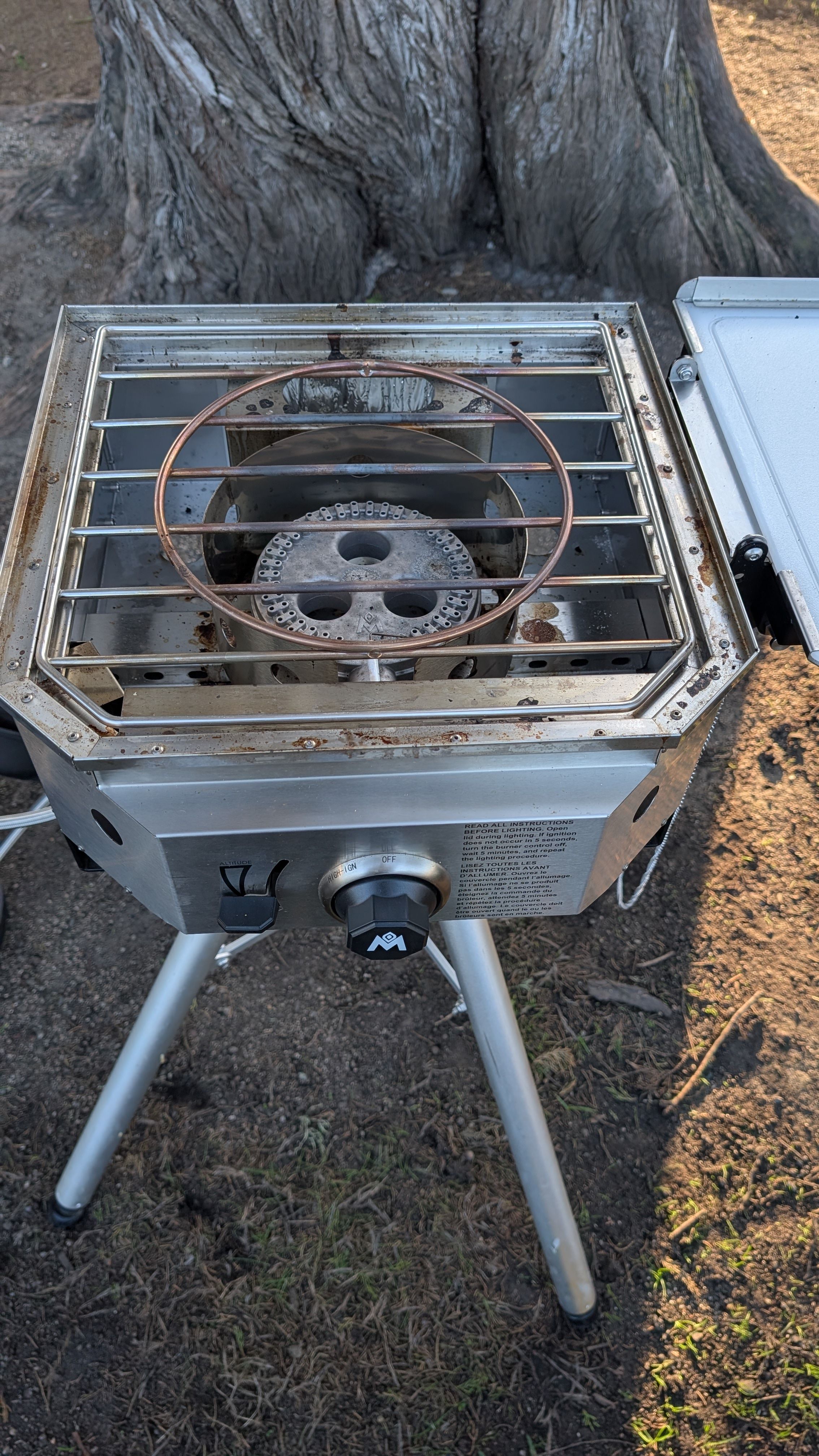 Photo of direct burner with cooking grate on top for high-heat searing