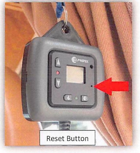 Close-up of thermostat with Flame button labeled showing blinking fault indicator
