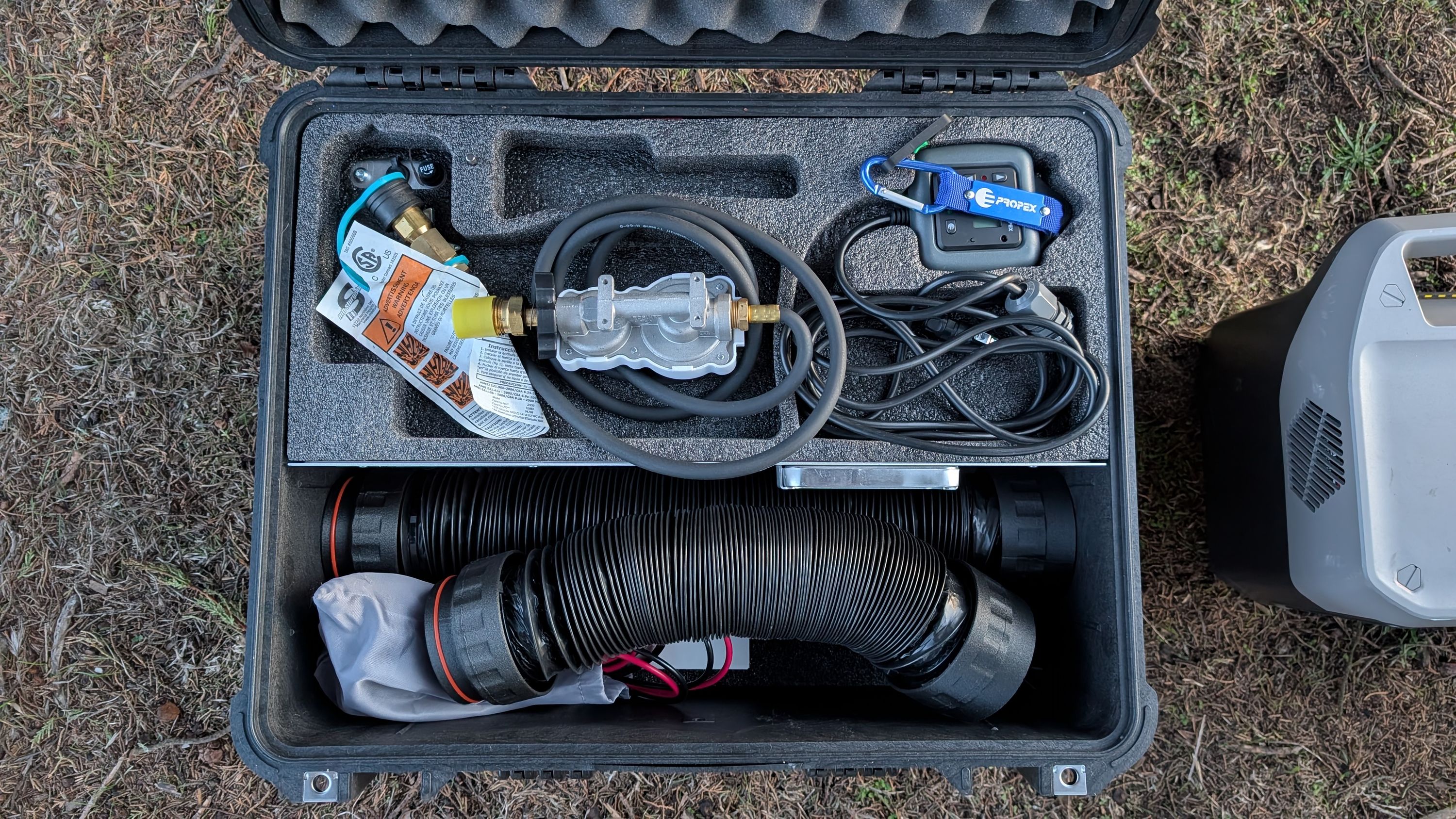 Photo of all heater components neatly packed inside Propex carrying case