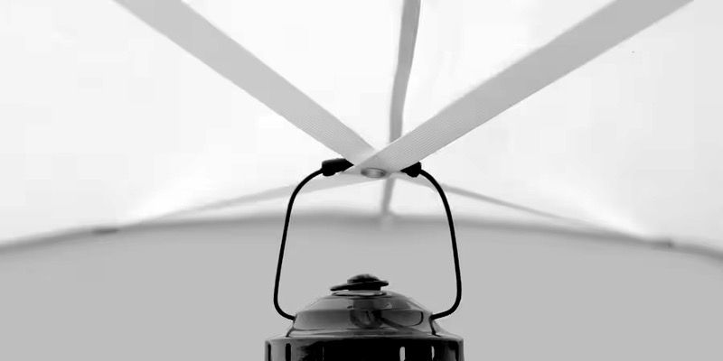Photo of lantern strap attached to ceiling junction inside tent