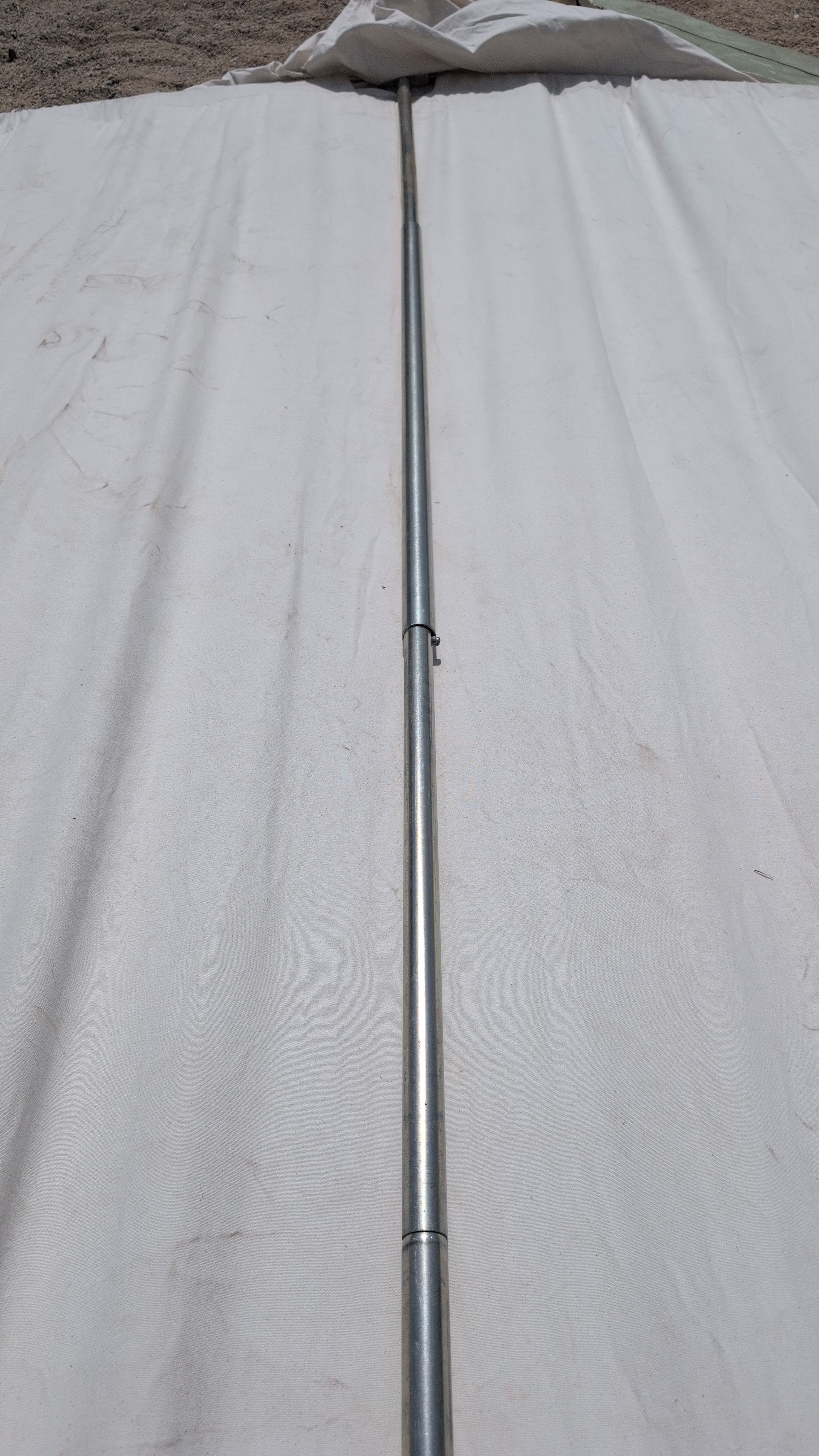 Close-up of center slip cover positioned over the crossbar joint