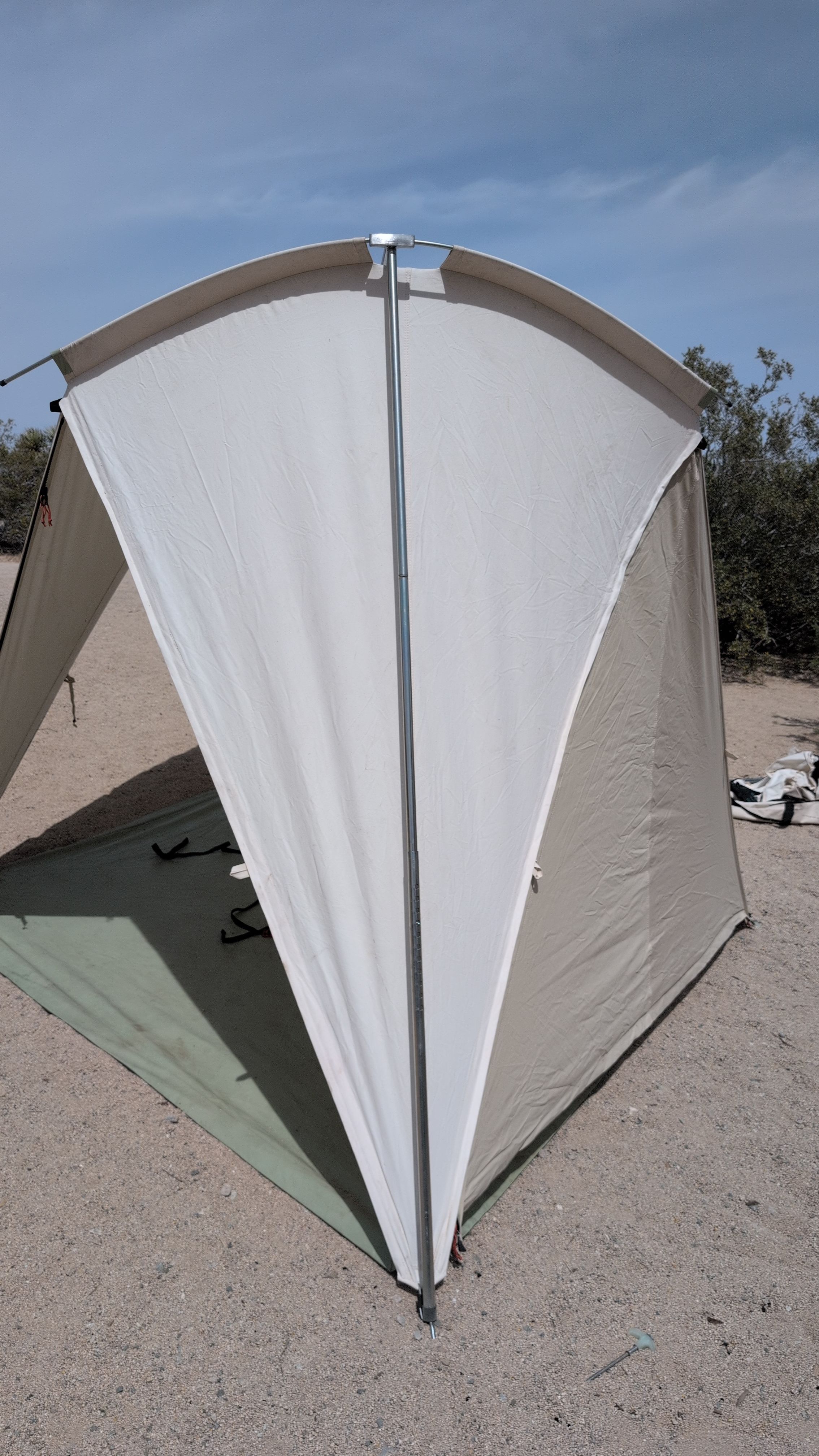 Photo of shelter frame raised with both T-connectors at peak