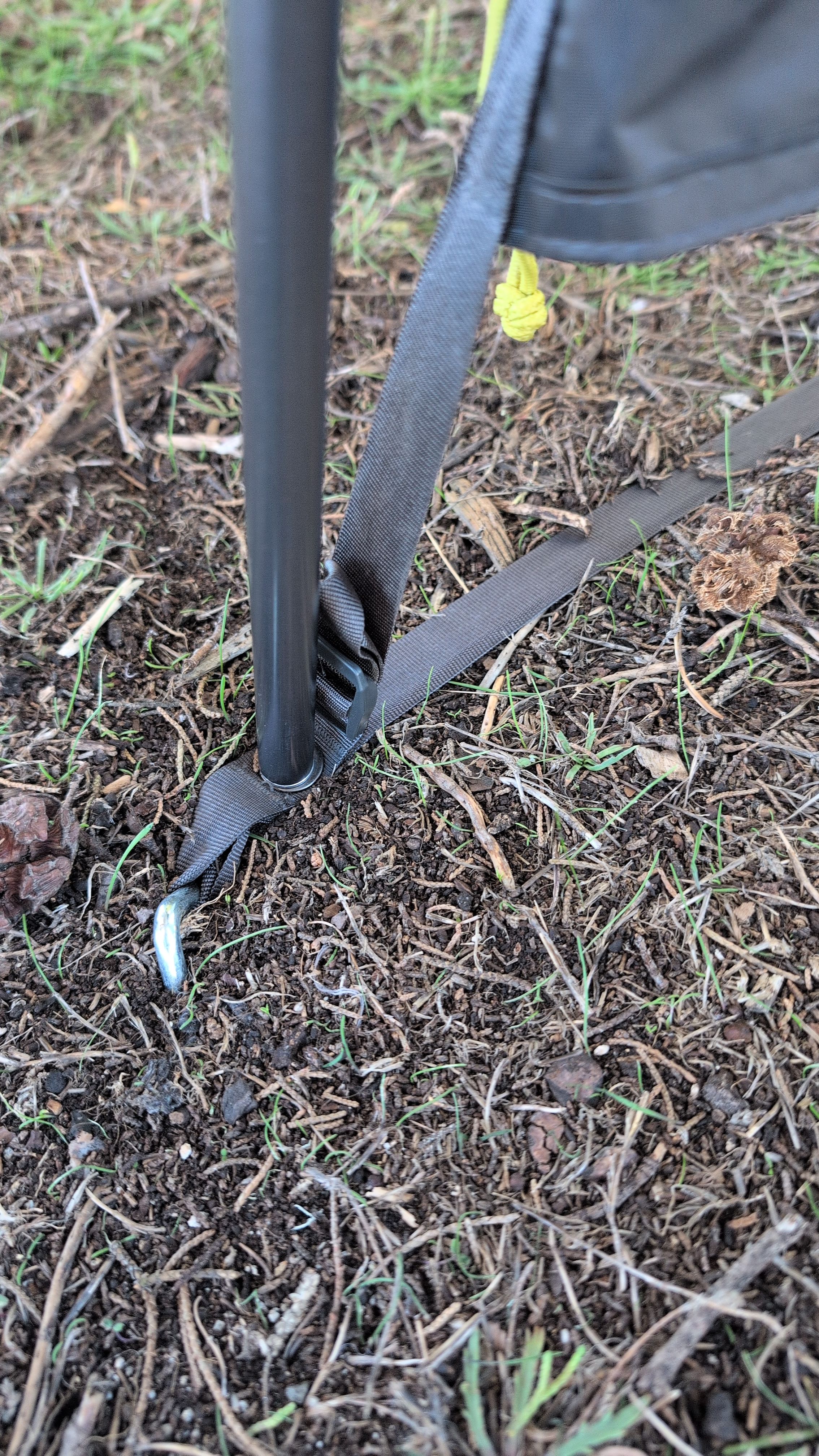 Photo showing webbing grommet being staked