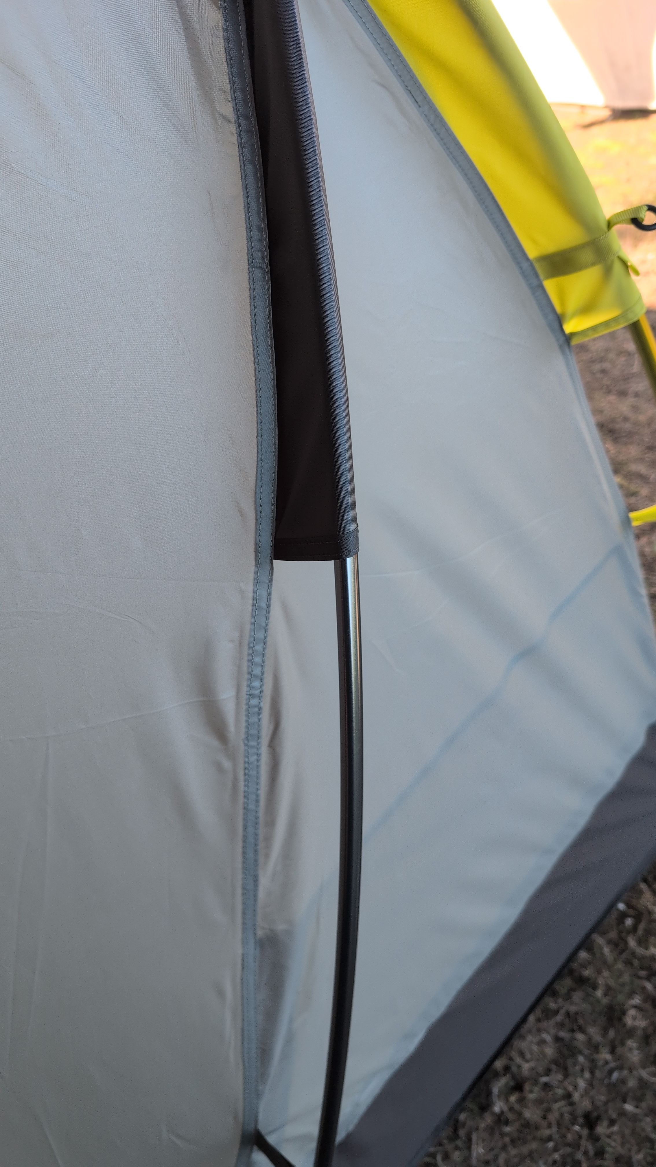Photo showing gray pole sleeve location on tent side