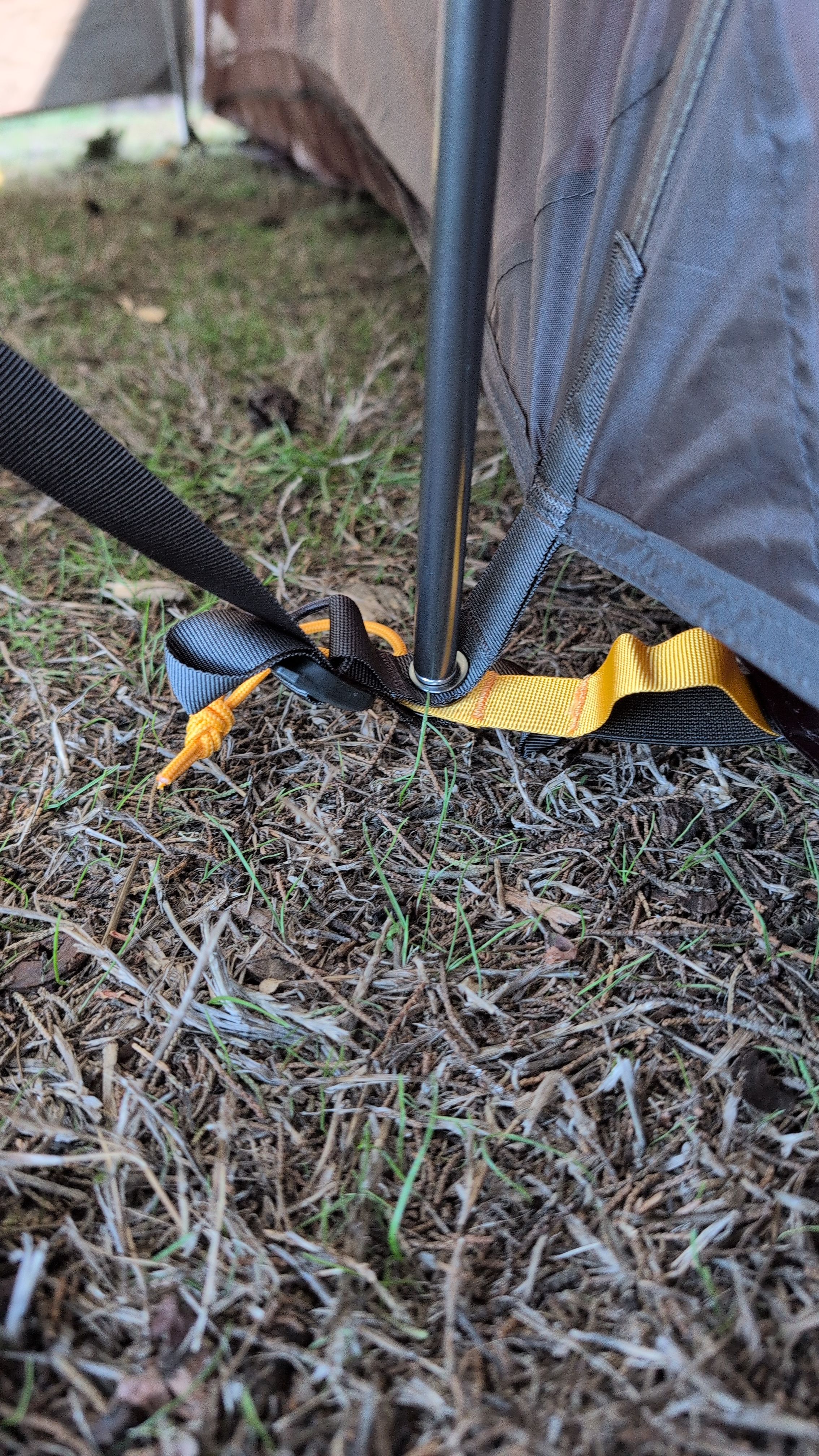 Photo showing vestibule grommet attaching to inner tent grommet